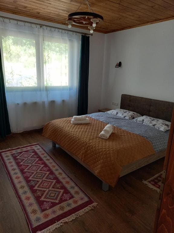 Al doilea dormitor cu pat dublu